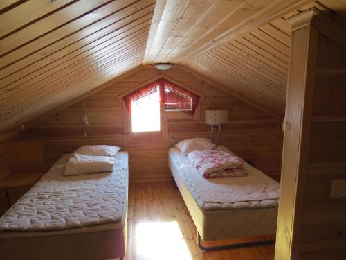 Arctic Polar Holiday Village客房内的一张或多张床位