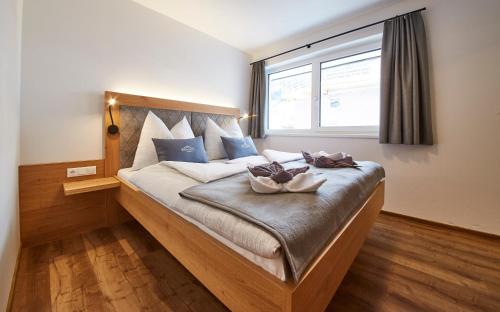Wiesl Lodge Saalbach客房内的一张或多张床位