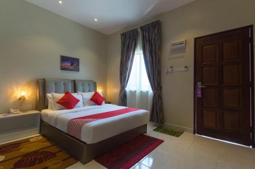 Nahdhoh Langkawi Resort客房内的一张或多张床位