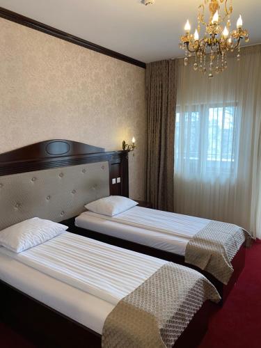 Hotel Onix客房内的一张或多张床位