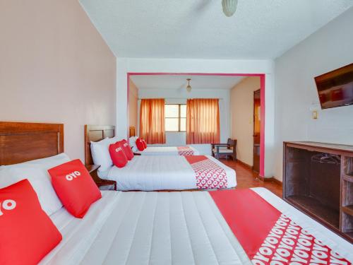 OYO Hotel Huautla, Oaxaca客房内的一张或多张床位
