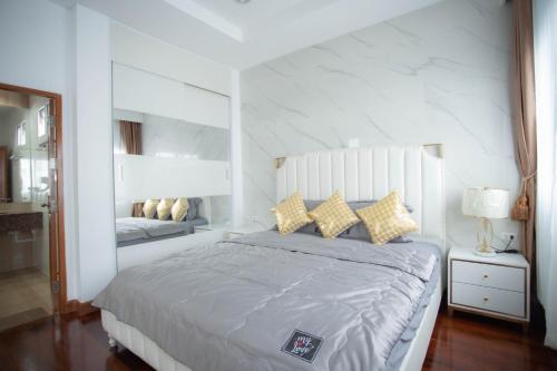 KW pool villa pattaya客房内的一张或多张床位