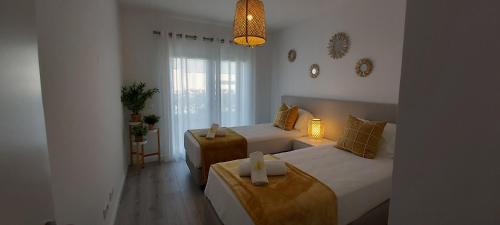 Albufeira beach apartment客房内的一张或多张床位