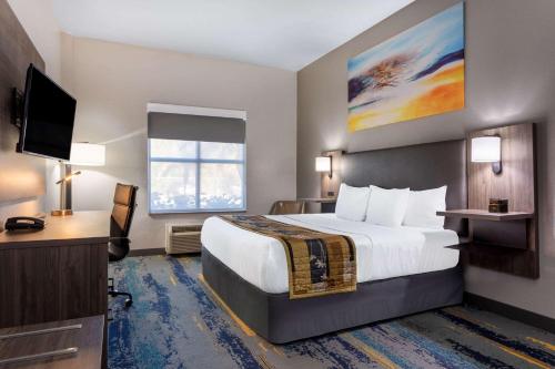 坦帕中心拉金塔旅馆及套房酒店客房内的一张或多张床位