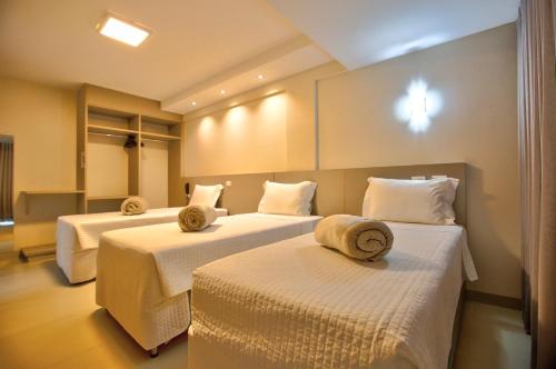 Novares Hotel客房内的一张或多张床位