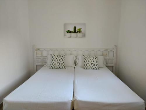 Viviendas Ferrer-Es Mal Pas客房内的一张或多张床位