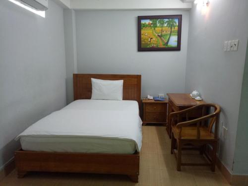 Khách sạn Phú An客房内的一张或多张床位
