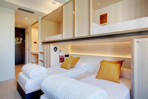 塞维利亚TOC旅馆客房内的一张或多张床位