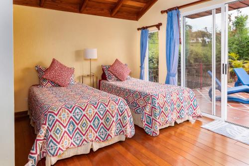Casa Bartzis, Close to Orosi and Tapanti National Park客房内的一张或多张床位