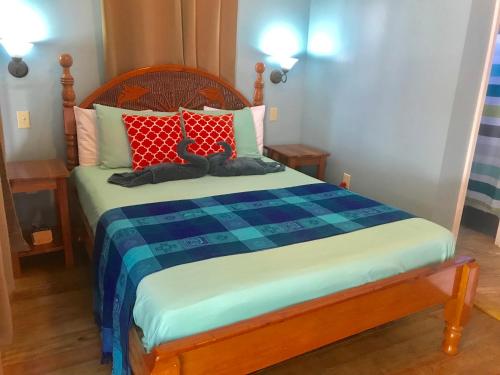 Tilt-Ta-Dock Resort Belize客房内的一张或多张床位