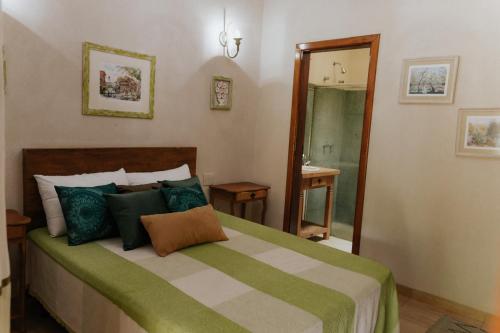 Hotel Pousada Chalé das Flores客房内的一张或多张床位