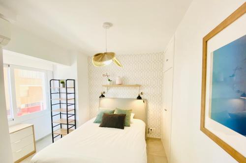 Smart Malagueta Seaview客房内的一张或多张床位