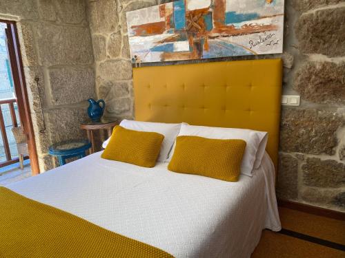 Casa Rualeira客房内的一张或多张床位