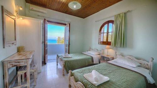 阿尔米罗斯海滩Villa Angela, seafront apartments, Almiros beach的相册照片