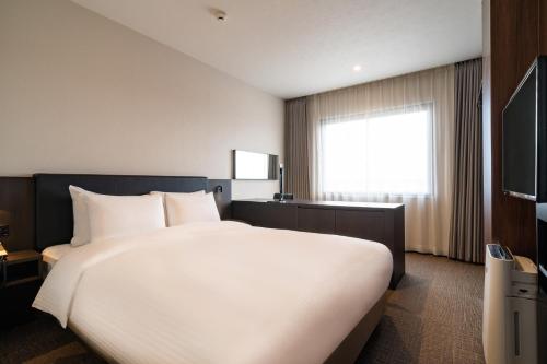五井大酒店客房内的一张或多张床位