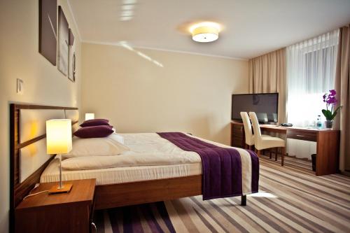 Hotel Mazovia Airport Modlin客房内的一张或多张床位