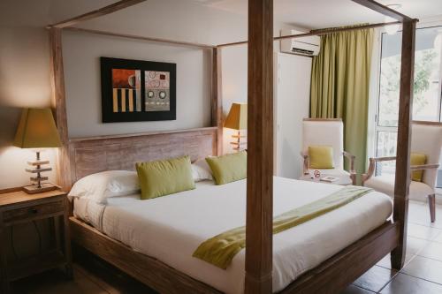 La Pagerie - Tropical Garden Hotel客房内的一张或多张床位