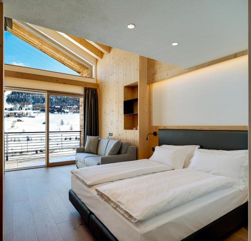 Vetta Alpine Relax客房内的一张或多张床位