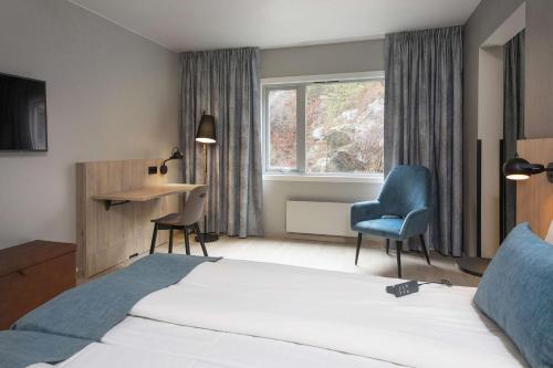 斯堪迪克科克斯塔德度假村客房内的一张或多张床位