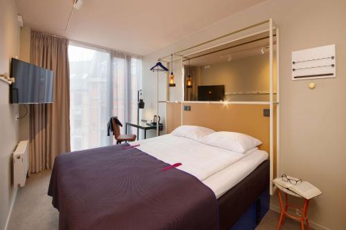 斯堪迪克边境酒店客房内的一张或多张床位