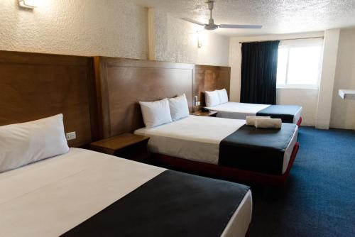 Hotel Central Irapuato - Hotel en Irapuato客房内的一张或多张床位