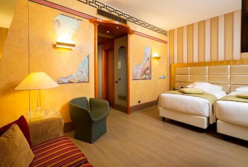 c-hotels Rubens客房内的一张或多张床位