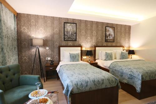 Cebeci Grand Hotel客房内的一张或多张床位