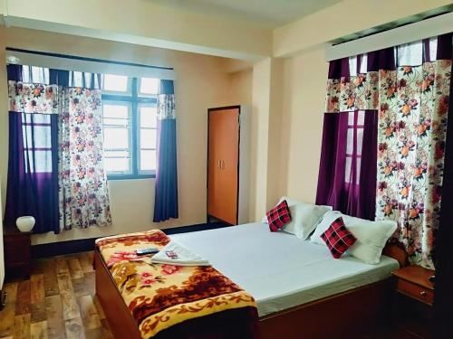 Say Xplorica New Sikkim客房内的一张或多张床位