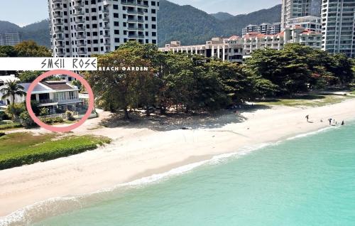 峇都丁宜Smell rose beach garden的红色圆圈的海滩空中景色