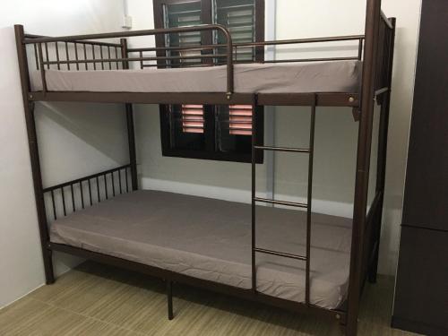 Homey Hostel客房内的一张或多张双层床