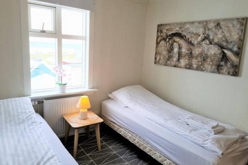 House with a warm soul in North Iceland客房内的一张或多张床位