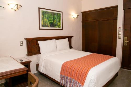 阿拉米达历史中心酒店客房内的一张或多张床位