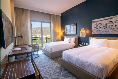 Torre Lucerna Hotel Ensenada客房内的一张或多张床位
