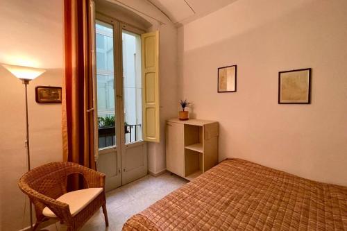 PetinoInApulia - Appartamento per famiglie e amici客房内的一张或多张床位