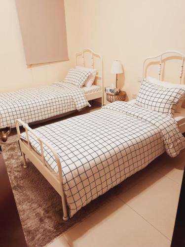 قرية الحمرا راس الخيمة客房内的一张或多张床位
