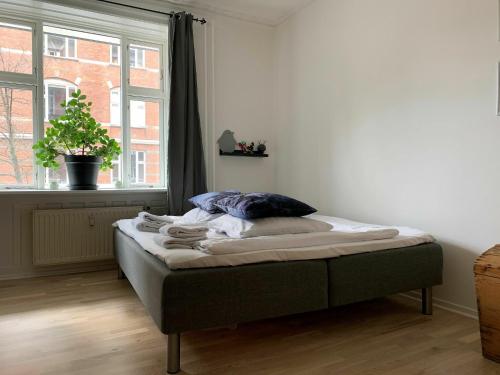 ApartmentInCopenhagen Apartment 720客房内的一张或多张床位
