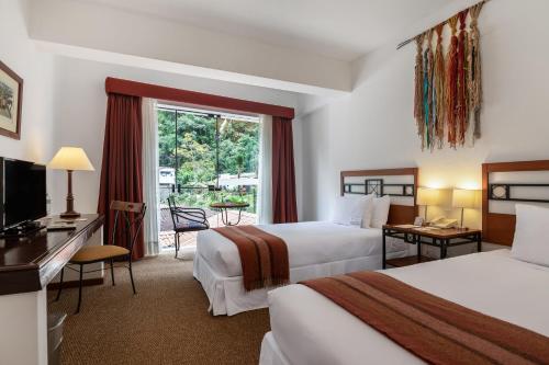 Tierra Viva Machu Picchu Hotel客房内的一张或多张床位