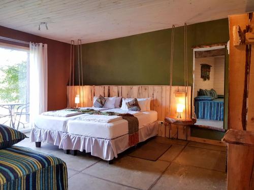 Elementos Eco Lodge客房内的一张或多张床位