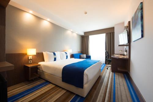 Liv City Hotels客房内的一张或多张床位