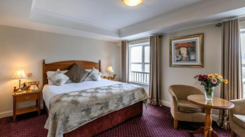纽格兰奇酒店客房内的一张或多张床位