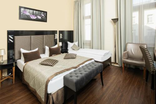 凯撒霍夫城市酒店客房内的一张或多张床位