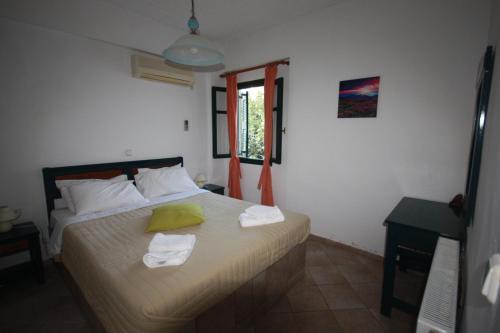 Cyclades Beach Apartments客房内的一张或多张床位
