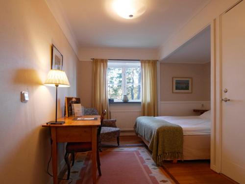 锡格蒂纳斯蒂弗特尔森酒店与会议中心客房内的一张或多张床位