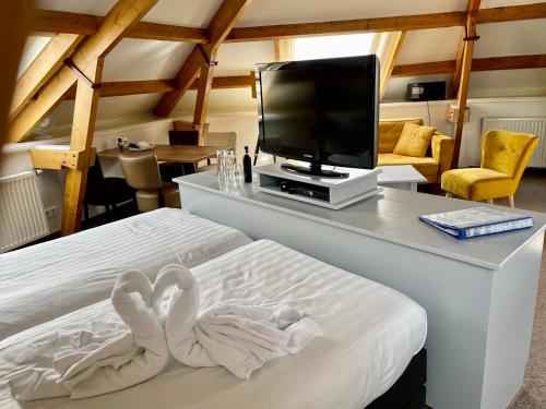 Havenhotel At Sea Texel客房内的一张或多张床位