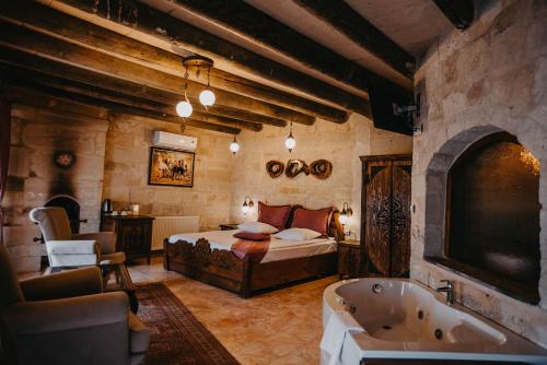 Prime Cappadocia Suites客房内的一张或多张床位