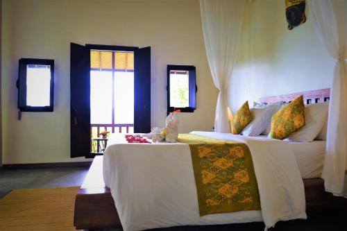 斯瓦尔巴厘旅馆客房内的一张或多张床位