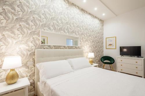 Traiano Luxury Home客房内的一张或多张床位