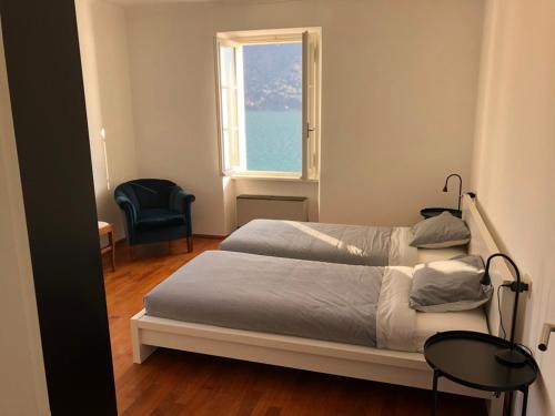 Oria Lugano Lake, il nido dell'aquila客房内的一张或多张床位