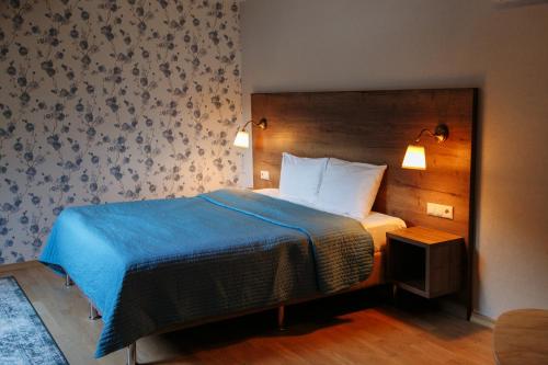 卢奇之乐酒店客房内的一张或多张床位