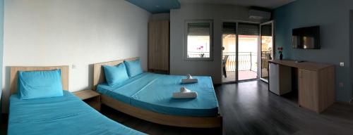 Ajkoski Apartments Pestani客房内的一张或多张床位